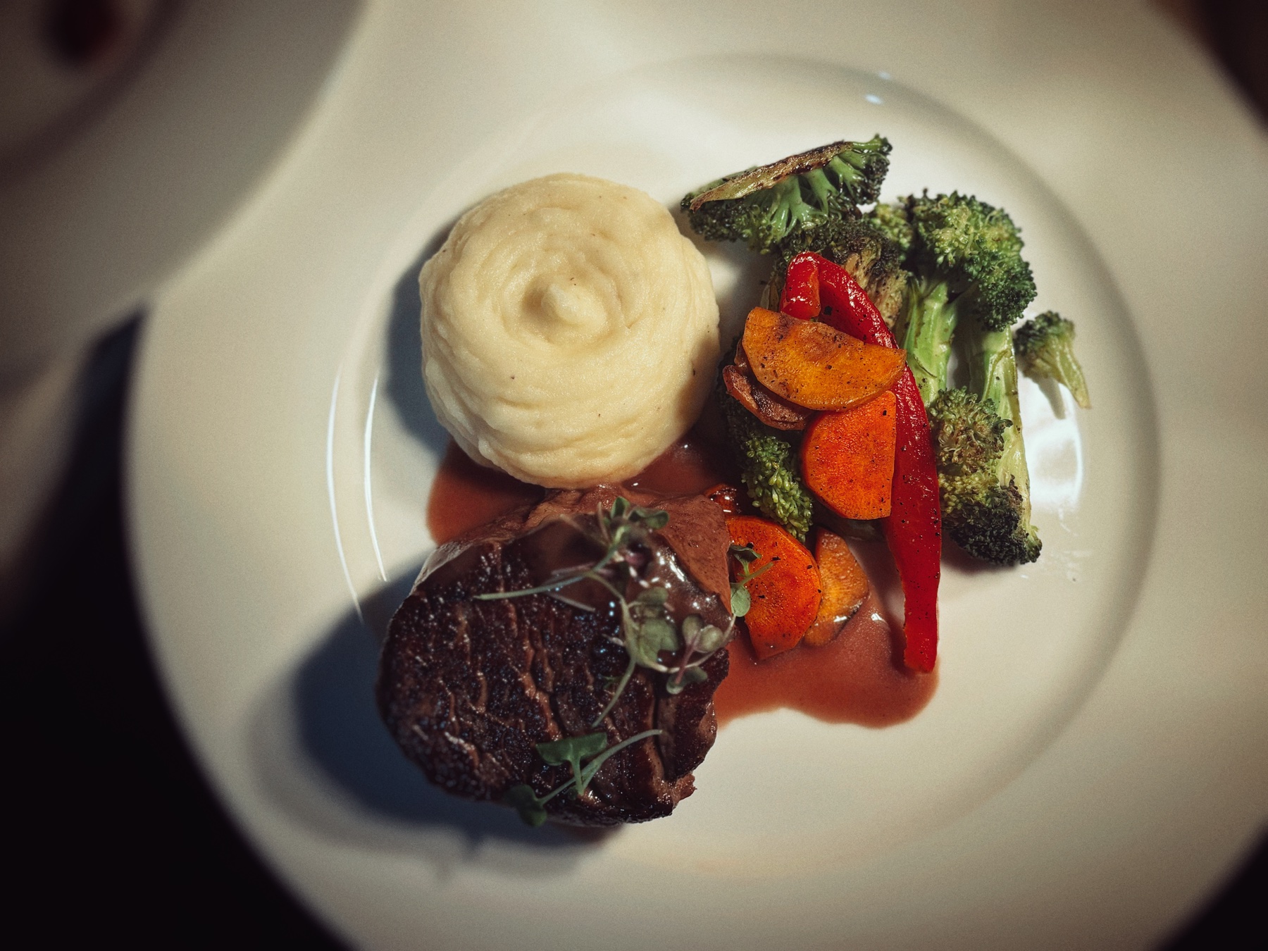 Filet dinner with mashed potatoes and roasted vegetables